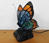 A Tiffany style butterfly lamp