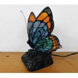 A Tiffany style butterfly lamp