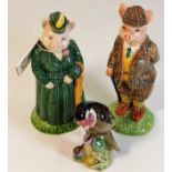 A Beswick Gentleman & Lady pig twinned with a Besw