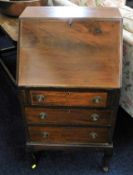 A small mahogany bureau 40in high x 21in wide £20-