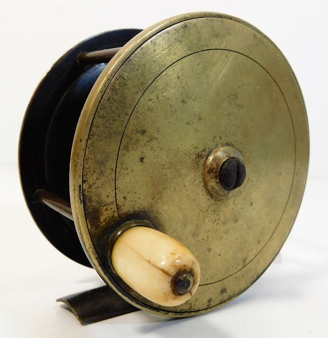 An antique brass Farlow fly fishing reel 4in diame