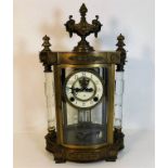 A decorative brass Ansonia clock 16.5in high x 9in