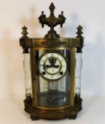 A decorative brass Ansonia clock 16.5in high x 9in