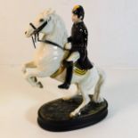 A Beswick rider & Lipizzaner horse, leather reigns