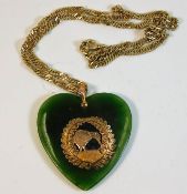 A 9ct gold mounted New Zealand jade heart shaped p