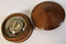 A 19thC. German compass in turned walnut case 2.5i