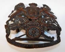 A large military helmet plate 3.75in tall