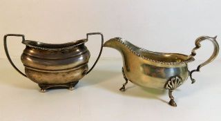 A Chester silver sugar bowl (small dent) twinned w