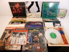 A quantity of 34 vinyl records including David Bow