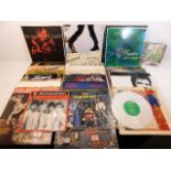 A quantity of 34 vinyl records including David Bow