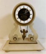 A French alabaster mantle clock with swinging cher