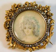 An ornate 19thC. French 18ct gold brooch set with