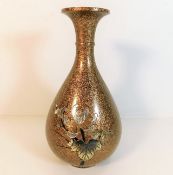 A decorative Japanese inlaid vase with flared rim