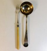 A silver ladle with gilt bowl twinned with ivory h
