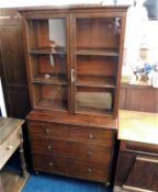 A 19thC. mahogany bookcase with glazed doors & thr