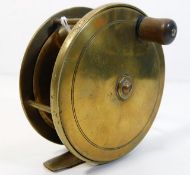 An antique brass fly fishing reel 4.5in diameter
