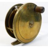 An antique brass fly fishing reel 4.5in diameter