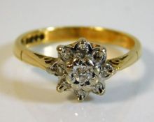 An 18ct gold ring set with diamonds size L 2.8g