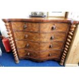 A Victorian serpentine front chest of five drawers