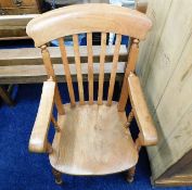 A beech & elm Windsor style armchair believed to h