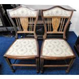 A pair of Edwardian inlaid chairs