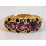 An antique Suffragette style ring set with garnet