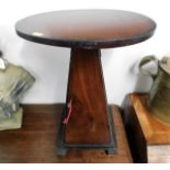 A small mahogany drinks table with cupboard & draw