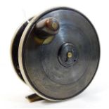 An antique bi-metal fly fishing reel 4.5in diamete