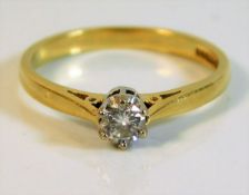 An 18ct gold ring set with approx. 0.22ct diamond