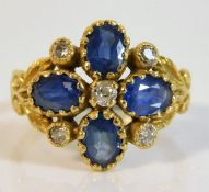 An 18ct gold sapphire & diamond ring set with appr