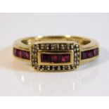 A 9ct gold ring set with diamond & ruby size N 3g