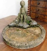 A garden stoneware bird bath with figure 24in wide