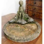 A garden stoneware bird bath with figure 24in wide