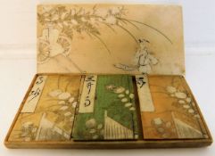 A cased set of three Meiji period Japanese ivory b