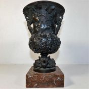 A marble mounted decorative 19thC. bronze vase wit