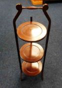 An Edwardian mahogany cake stand 35in high