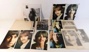 A Beatles White Album with band pictures & four ha