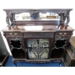 A decorative mahogany display cabinet with mirror