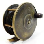 An antique brass Wells fly fishing reel 4.5in diam