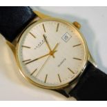 A gents 9ct gold cased Garrard quartz wrist watch,