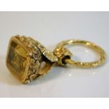 An 18ct gold mounted citrine seal (letter R) with
