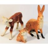 A Beswick hare 7in, Beswick calf 4.5in & cat 3.25i