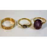 An 18ct gold diamond ring, lacking one stone 2.3g, a 9ct band lacking stones 2.4g & a 9ct amethyst r