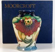 A boxed Moorcroft vase, first quality 3.5in tall