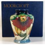 A boxed Moorcroft vase, first quality 3.5in tall