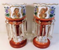 A pair of decorative pictorial glass lustres 14.5i