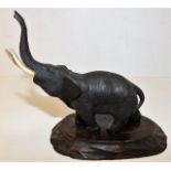 A Meiji period Japanese bronze elephant signed by