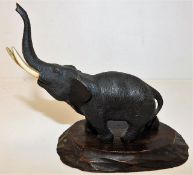 A Meiji period Japanese bronze elephant signed by