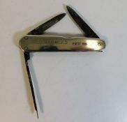 A 1920's Sheffield silver mounted three tool pen k