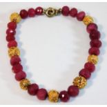 A faceted ruby & silver gilt necklace 103.5g appro